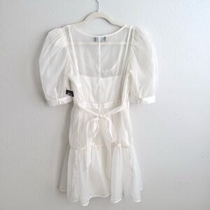 NWT Danielle Bernstein Sheer Ivory Puff Sleeve Babydoll Tie Back Mini Dress